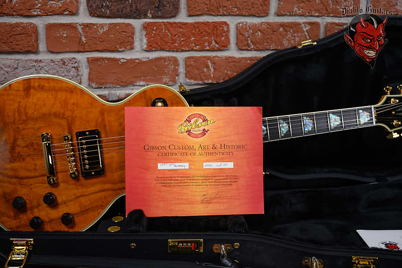 
                      
                        Gibson Custom Shop 50th Anniversary Les Paul Custom Curly Koa Top Antique Natural #6 of 50 2002 w/OHSC
                      
                    