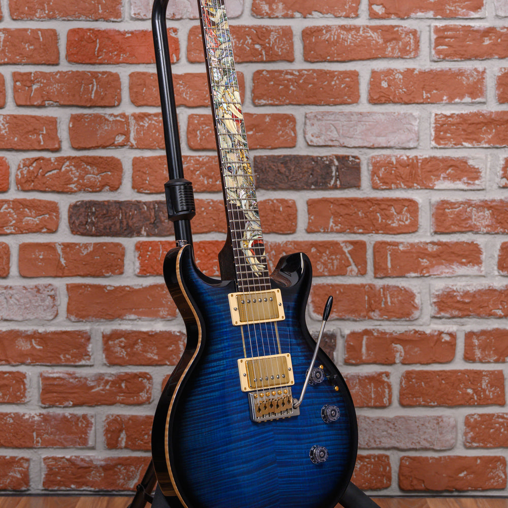
                      
                        PRS Santana Dragon 25th Anniversary #58 of 60 Curly Maple Top in Blue Burst 2010 w/OHSC
                      
                    