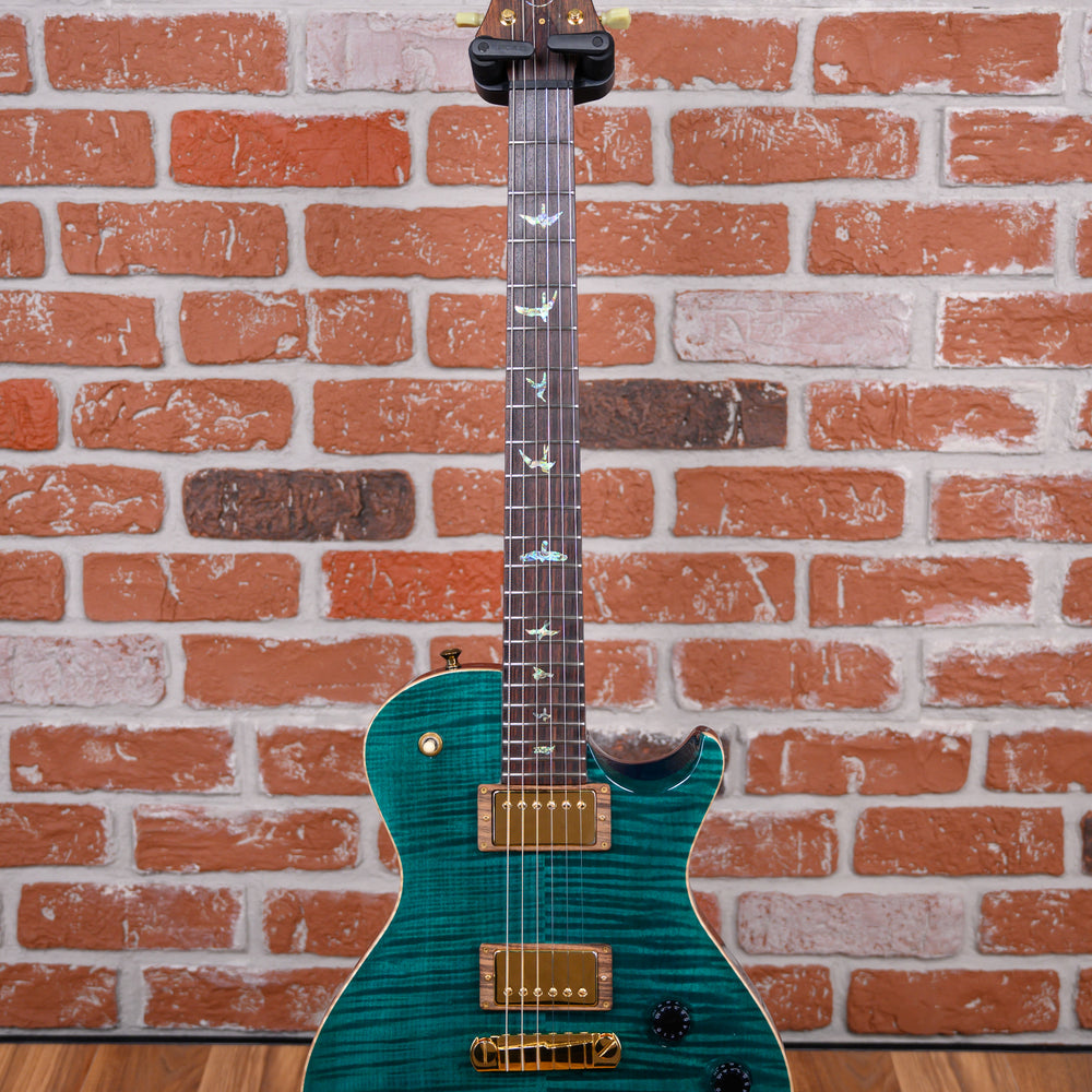 
                      
                        PRS Artist Package Single Cut Flame Maple Top Translucent Turquoise 2001 w/OHSC
                      
                    