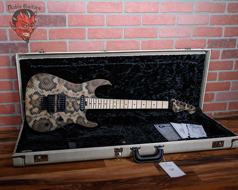 
                      
                        Charvel USA Custom Shop Warren DeMartini USA Signature Snakeskin Graphic 2024 w/OHSC
                      
                    