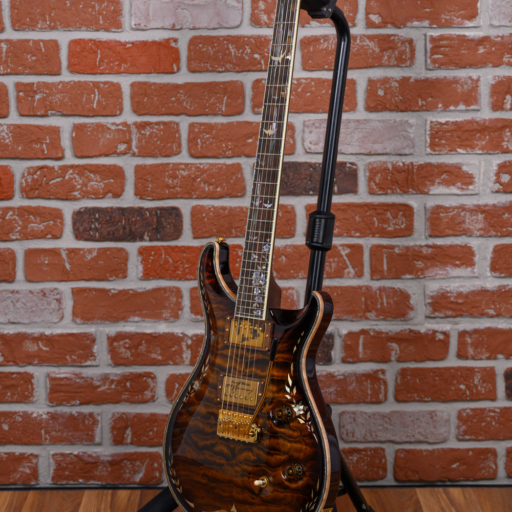 
                      
                        PRS Private Stock #1320 10th Anniversary Quilted Maple Top Amber Tiger Eye Burst with Brazilian Rosewood 2006 w/OHSC
                      
                    