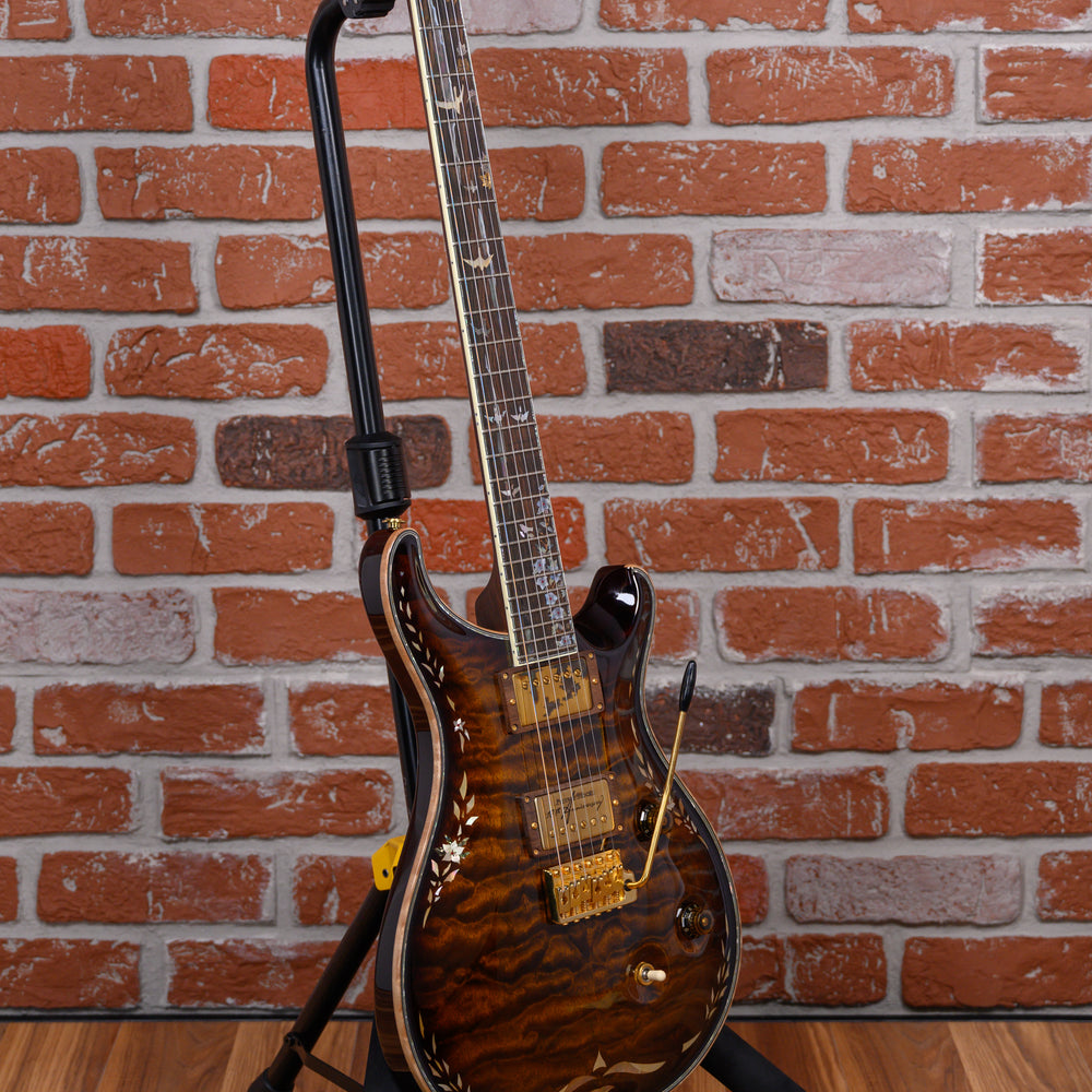 
                      
                        PRS Private Stock #1320 10th Anniversary Quilted Maple Top Amber Tiger Eye Burst with Brazilian Rosewood 2006 w/OHSC
                      
                    