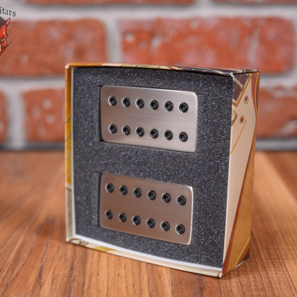 
                      
                        Bare Knuckle Juggernaut Humbucker set with Brushed Nickel Covers and Black Bolts 53mm Trem Spaced
                      
                    