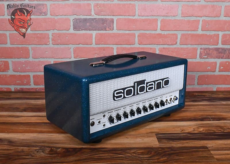 
                      
                        Soldano Custom Shop SLO30 30Watt All Tube Head w/ Matching 2x12 Cab Ocean Sparkle Tolex With White Warp Weeve Grill and Black Chicken Head Knobs
                      
                    