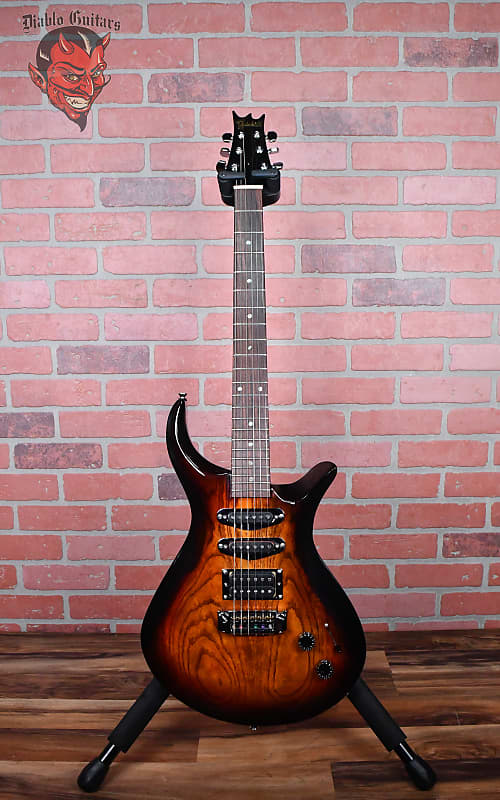
                      
                        Driskill USA Custom Diablo HSS Violin Sunburst 1998 w/OHSC
                      
                    