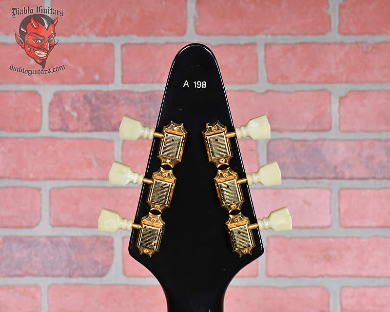 
                      
                        Gibson Heritage Series ‘58 Korina Flying V Ebony 1982 w/OHSC
                      
                    