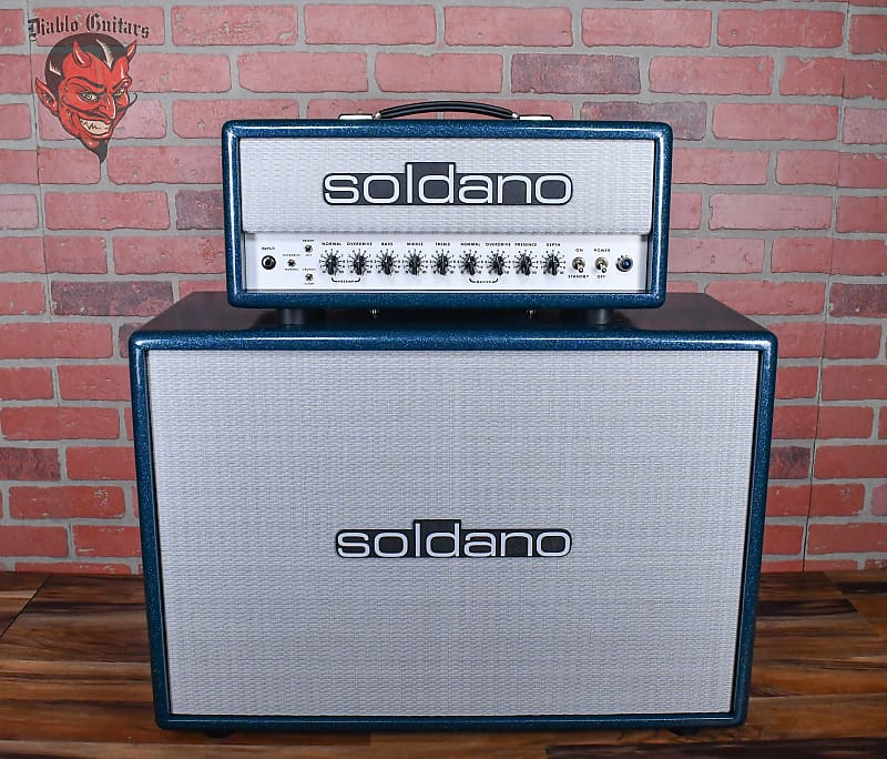 
                      
                        Soldano Custom Shop SLO30 30Watt All Tube Head w/ Matching 2x12 Cab Ocean Sparkle Tolex With White Warp Weeve Grill and Black Chicken Head Knobs
                      
                    