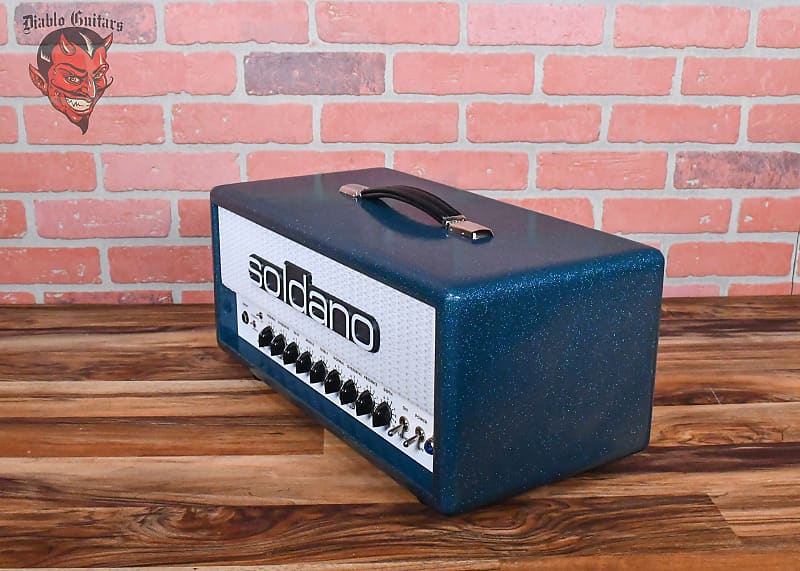 
                      
                        Soldano Custom Shop SLO30 30Watt All Tube Head w/ Matching 2x12 Cab Ocean Sparkle Tolex With White Warp Weeve Grill and Black Chicken Head Knobs
                      
                    