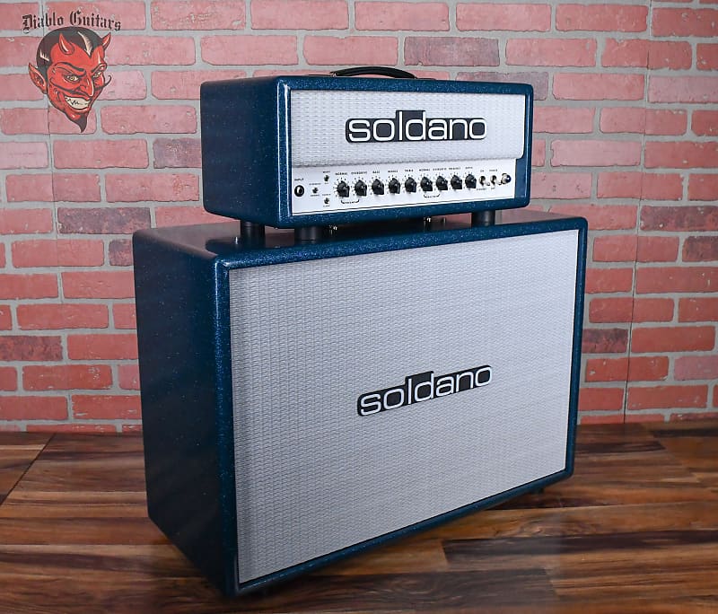 
                      
                        Soldano Custom Shop SLO30 30Watt All Tube Head w/ Matching 2x12 Cab Ocean Sparkle Tolex With White Warp Weeve Grill and Black Chicken Head Knobs
                      
                    