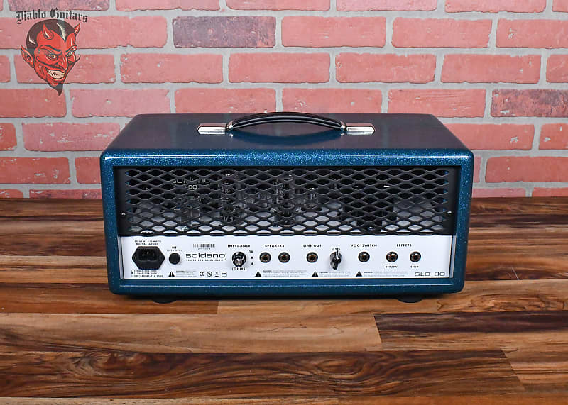 
                      
                        Soldano Custom Shop SLO30 30Watt All Tube Head w/ Matching 2x12 Cab Ocean Sparkle Tolex With White Warp Weeve Grill and Black Chicken Head Knobs
                      
                    