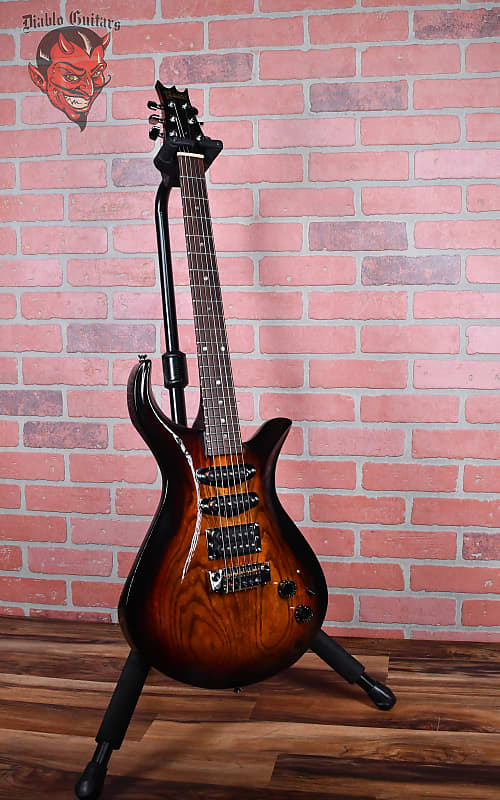
                      
                        Driskill USA Custom Diablo HSS Violin Sunburst 1998 w/OHSC
                      
                    